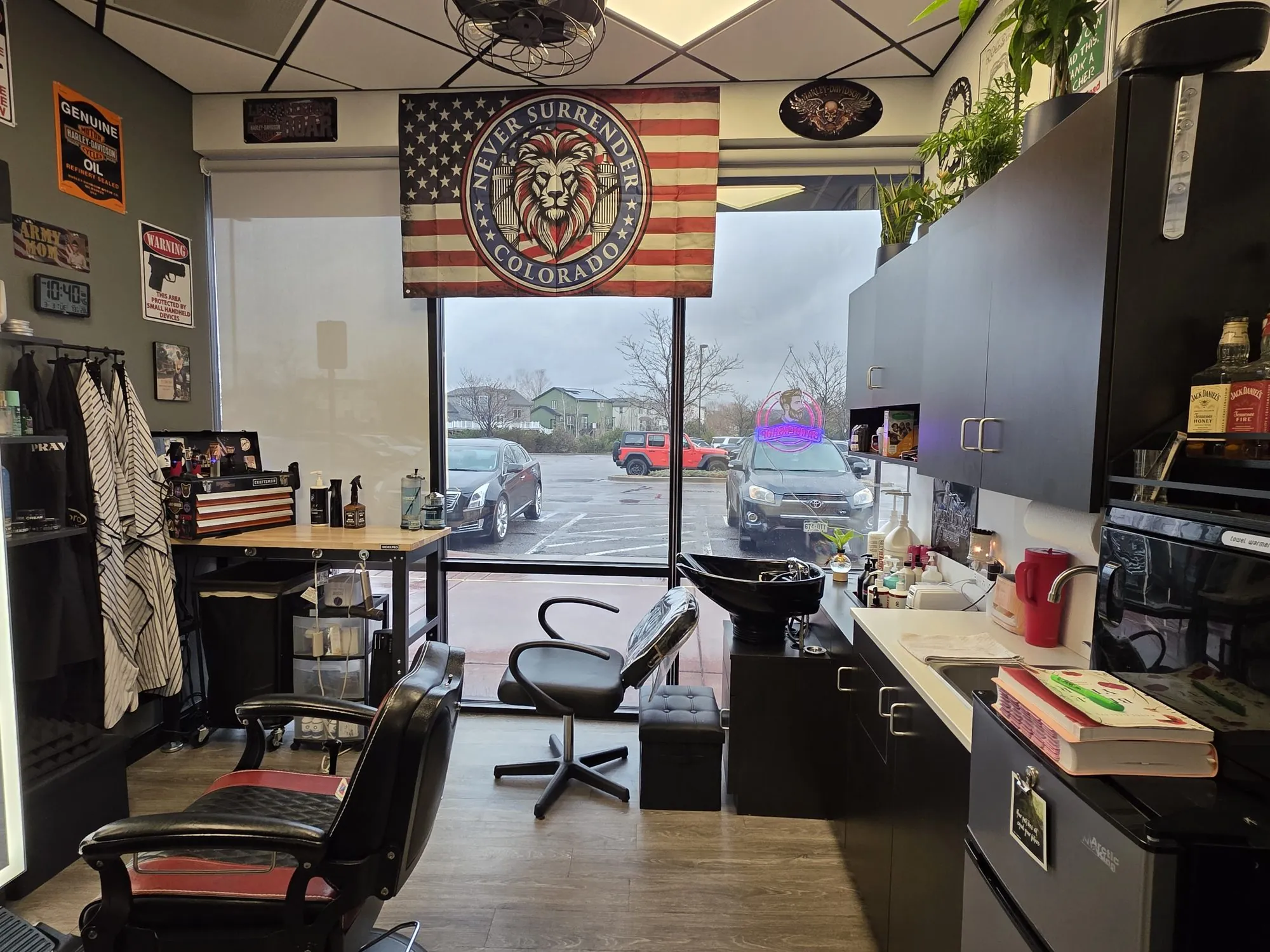 Wash station and product shelves inside RockStar Barber