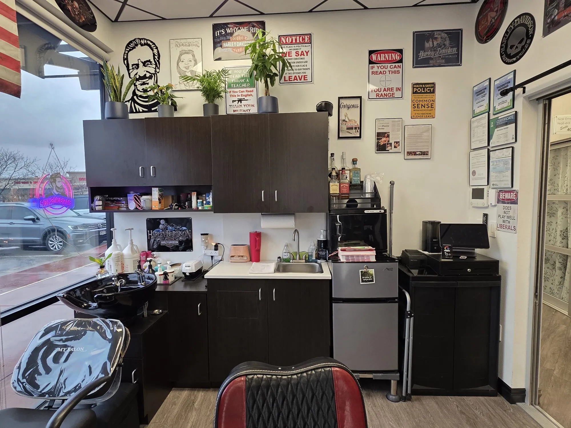 Front window and seating area of RockStar Barber with Colorado decor